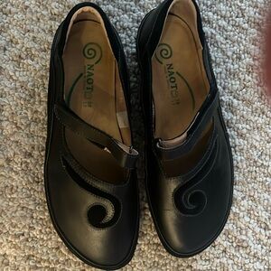 NAOT black leather shoes. Very comfortable!